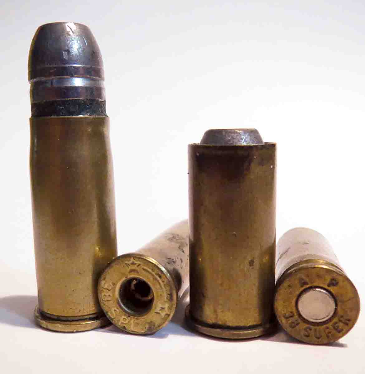 These cartridges illustrate mistakes made by handloaders not paying attention to detail. Included is a (left to right): .44 Special case run through .38-40 dies, a loaded round with primer omitted, a bullet that was not crimped and a primer seated with too much force; it may or may not ignite upon firing.